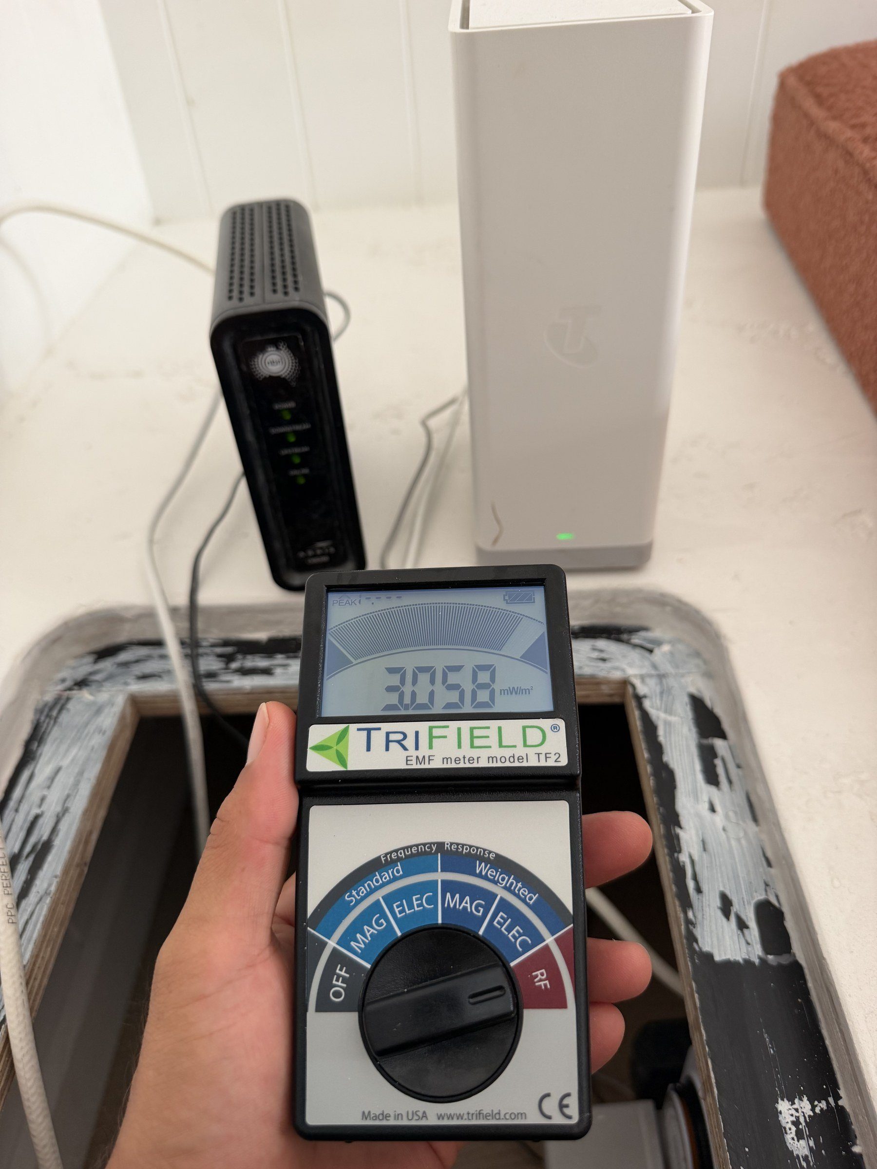 TriField TF2 showing 3.058 mW/m2 RF reading at NBN modem and mesh router -- Palm Beach QLD