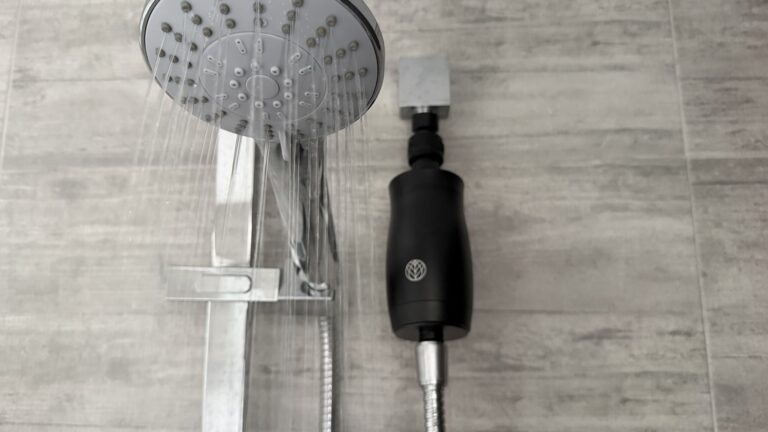 Earth's Water Premium Shower Filter installed and running — overhead view, Palm Beach QLD test unit