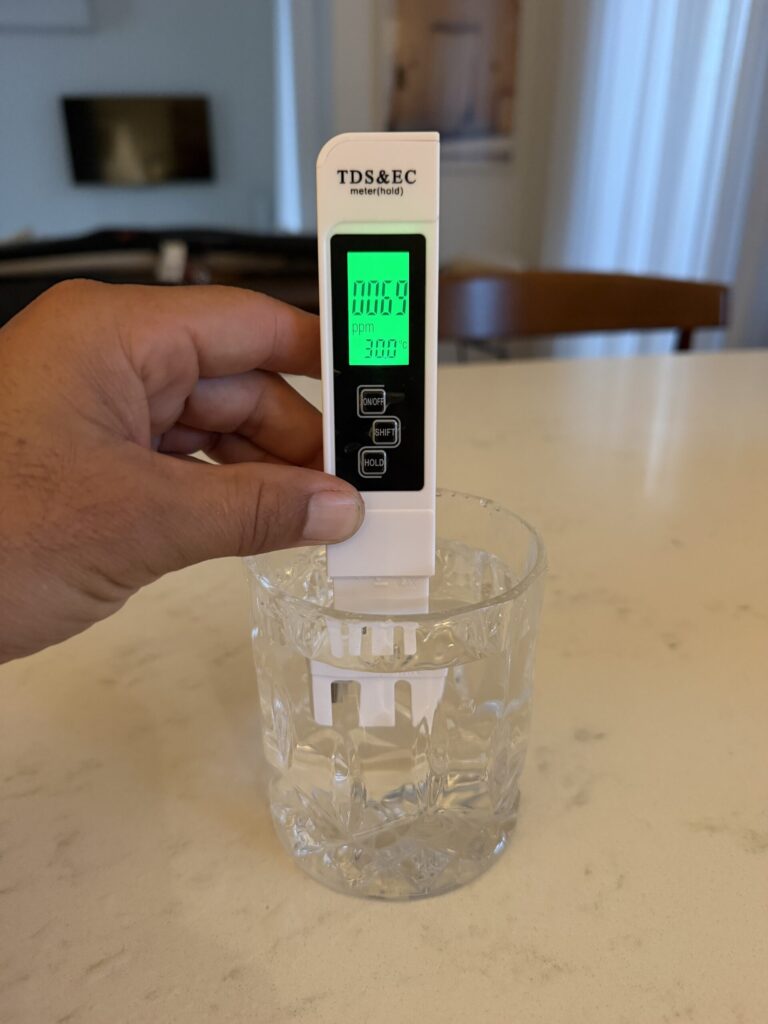 TDS meter showing 69ppm Palm Beach tap water unfiltered